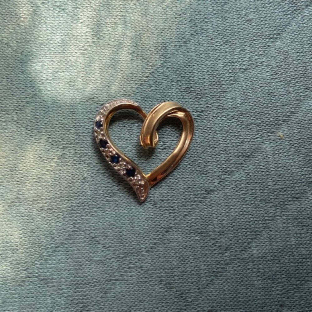 10kt solid gold, diamonds and sapphire pendant